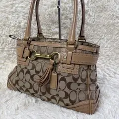 COACH シグネチャー ハンドバッグ タッセル付き y2k - メルカリ