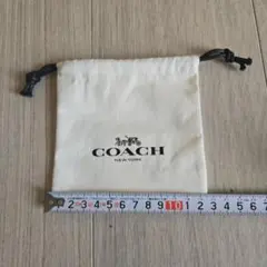 COACH アイボリー ドローストリングポーチ