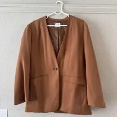 coenのブラウン ノーカラージャケット
