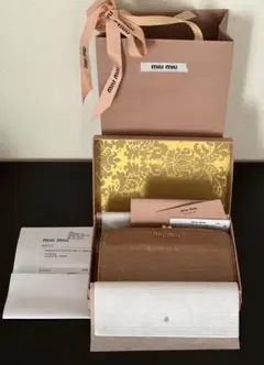 miu miu クロコ型押し 二つ折り財布 がま口のサムネイル