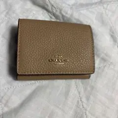 COACH 三つ折り財布 ベージュ系のサムネイル