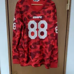 A BATHING APE カモ柄 フットボールシャツ 88 レッド - メルカリ