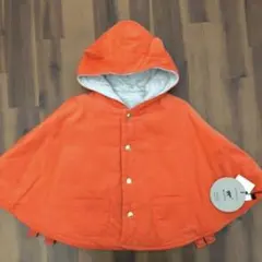 新品タグ付き、定価6600円、オレンジ フード付き リバーシブルポンチョ