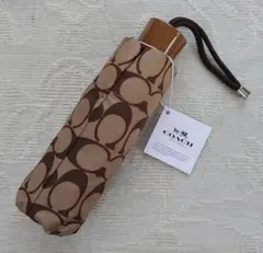 COACH コーチ 新品 未使用 折り畳み傘 シグネチャー ロゴ タグ付き