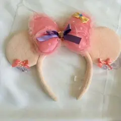 ディズニーリゾート　ミニー カチューシャ ピンク リボン イヤリングカチューシャ