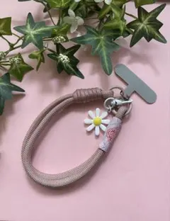 スマホ　ハンドストラップ 携帯　花チャーム付き かわいい ライトピンク　手首