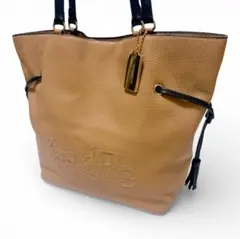 コーチ アンディ トートバッグ レザー ベージュ 馬車ロゴ A4