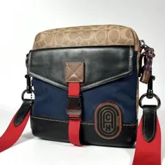コーチ　ショルダーバッグ　PVC シグネチャー　クロスボディ　69290