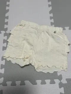 プティマイン　アイボリー バックフリルパンツ　110サイズ
