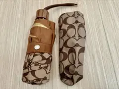 コーチ 折りたたみ傘 ブラウン ロゴ入り