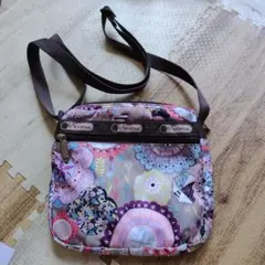 新品✨LeSportsac MANOUSH ハンドバッグ チャーム付 黒 がま口 - メルカリ