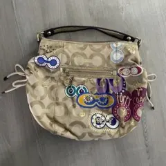 【COACH コーチ バッグ ポピー シグネチャー スタッズ ゴールド ベージュ