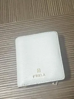 FURLA 二つ折り財布 水色のサムネイル