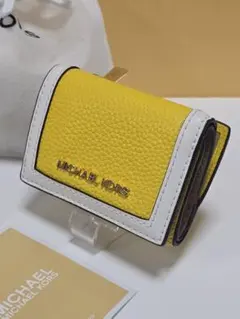 新品マイケルコースJET SET TRAVEL トライフォールドジップウォレット