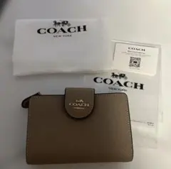 COACH コーチ　トープ　ベージュ　二つ折り財布
