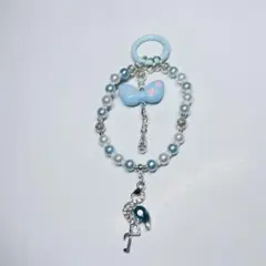 ハンドメイド 青色ストラップ 鳥と鍵チャーム