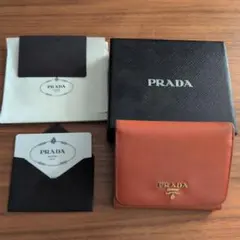 PRADA サフィアーノレザー 三つ折り財布 オレンジのサムネイル