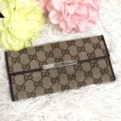 美品✨️GUCCI GGキャンバス ロゴプレート wホック 長財布 折り財布