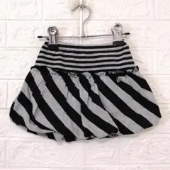 BEBE チャーム付き斜めストライプバルーンスカート