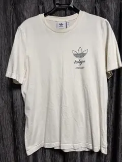 【希少/美品/廃盤】アディダスオリジナルズTシャツ tokyoロゴアイボリー白Lのサムネイル