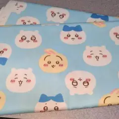 はぎれ　ちいかわ　顔プリント生地 水色