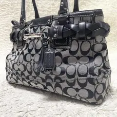 【良品】コーチ　トートバッグ　レザー　黒　編み込み　フリンジ　ロゴ金具