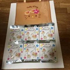 日焼け キティPVCトートバッグとアクリルミニチャーム 6個セット新品未開封