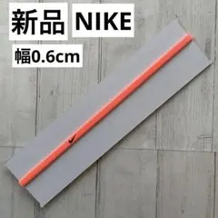 新品 NIKE スキニーヘッドバンド 1本 ネオン ヘッドギア 細 オレンジのサムネイル