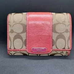 COACH シグネチャー×ピンクレザー 二つ折り財布
