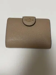 COACH 二つ折り財布 ベージュ