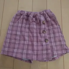 ピンク系チェック ボタン付きスカート風パンツ
