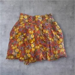 【新品タグ付き】レモン・ぶどう柄 キュロットパンツ オレンジ系 Lサイズ