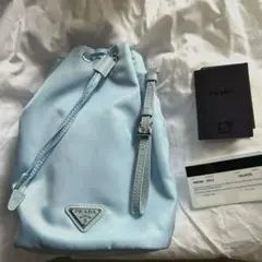 PRADA Re nylon ライトブルー 巾着ポーチ