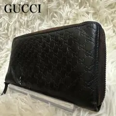 グッチ マイクロシマ ラウンドジップ 長財布 型押し レザー ダークブラウン