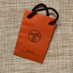 HERMES オレンジ ショップ袋ミニサイズ