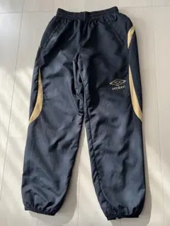 umbro アンブロ　ピステパンツ ブラック/ゴールド 150