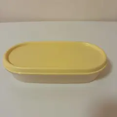 タッパーウエア。イエロー プラスチック食品保存容器 楕円形