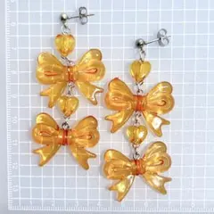 054 オレンジ リボン ハート クリア 派手 可愛い ピアス 推し活