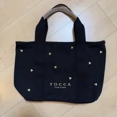 新品】TOCCA キャンバストートバッグ ブラック ハート柄 - メルカリ