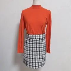 オレンジニット