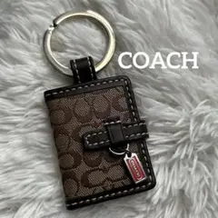 COACH 手帳型 チャーム キーホルダー シグネチャー 総柄