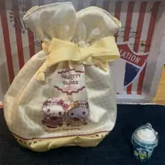 Hello Kitty DOLLY MIX 巾着 イエロー おまけ付きのサムネイル