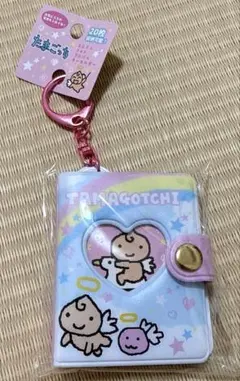 《新品未使用・未開封》TAMAGOTCHI 天使っち ミニシール帳キーホルダーのサムネイル