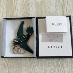 袋付き未使用コーチCOACH レインボー 恐竜 キーホルダー本物 - メルカリ