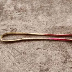 金色とピンクの房付き帯締め