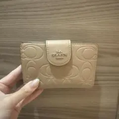 coach 二つ折り財布 キャメル