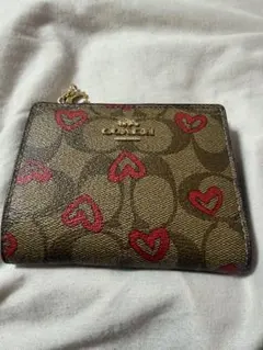 COACH コーチ ラウンドファスナー シグネチャーハート柄