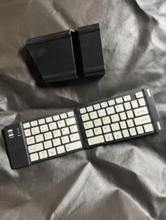 値下げ使用時間少ない折りたたみ式Bluetoothキーボードとホルダー