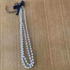 ロングパール風ネックレス リボン付き