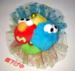 ユニバーサルスタジオジャパン エルモ・クッキーモンスター コサージュ